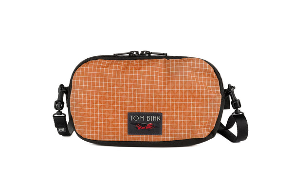 The Bantam in Zest 200 Halcyon with a shoulder strap